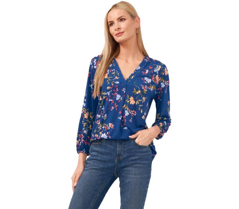 woman in flower blouse