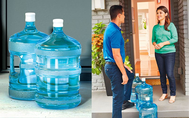 man and woman with water bottles