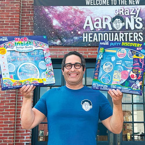 Man holding up putty sets