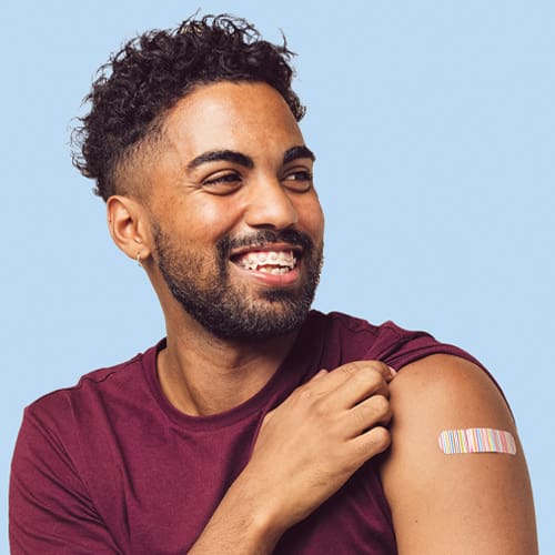 Man with bandage on arm after shot