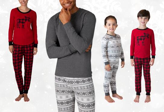 A family of four wears a cute winter pajama set.